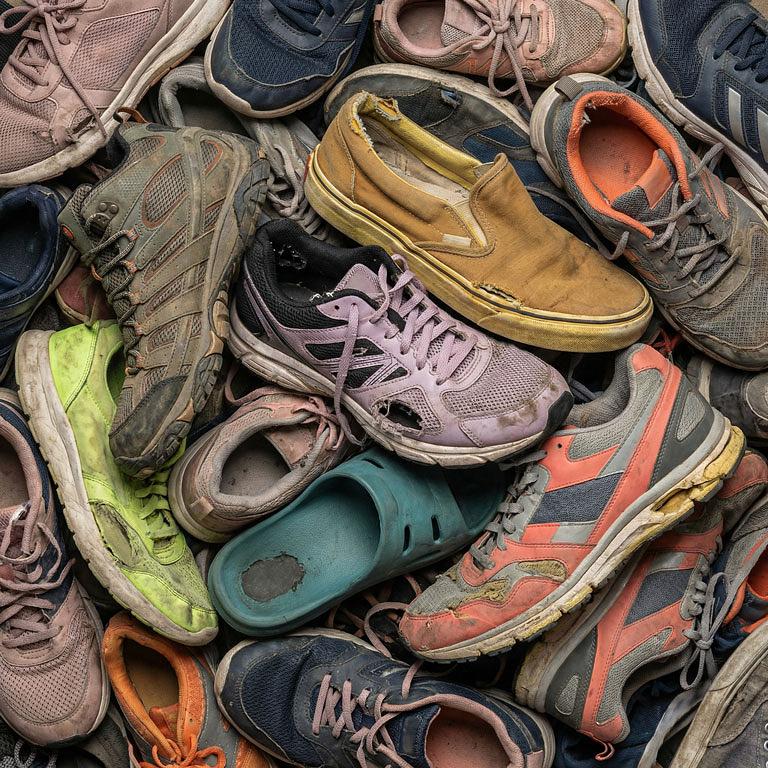 worn out shoes and trainers 